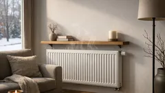 Mit einem Regal über dem Heizkörper die Wärme besser verteilen und Heizkosten senken
